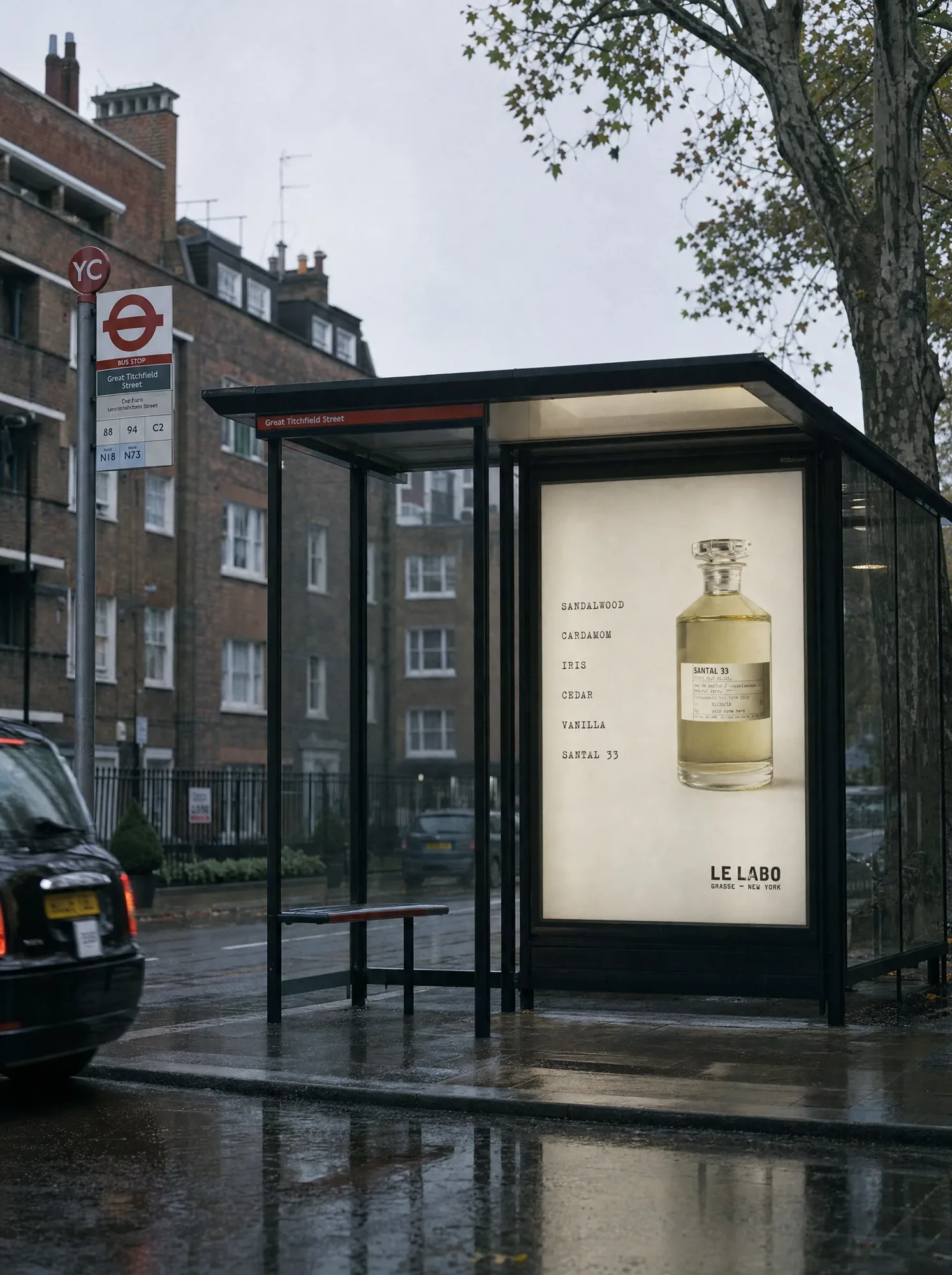 Le Labo Santal 33 bus shelter advert on a wet London street in Marylebone.